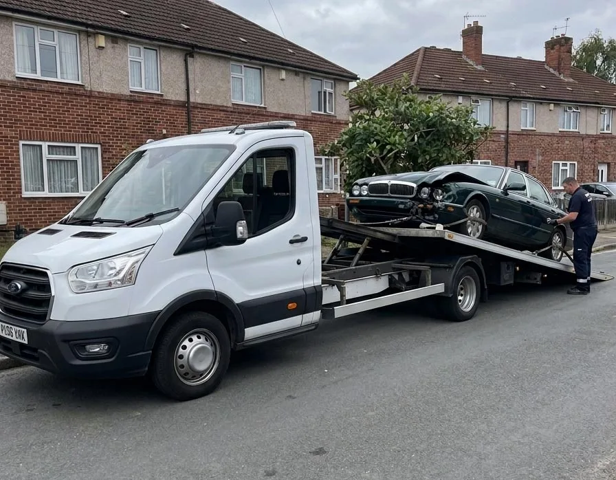 Damaged car being recovered by vehicle transport service in Essex